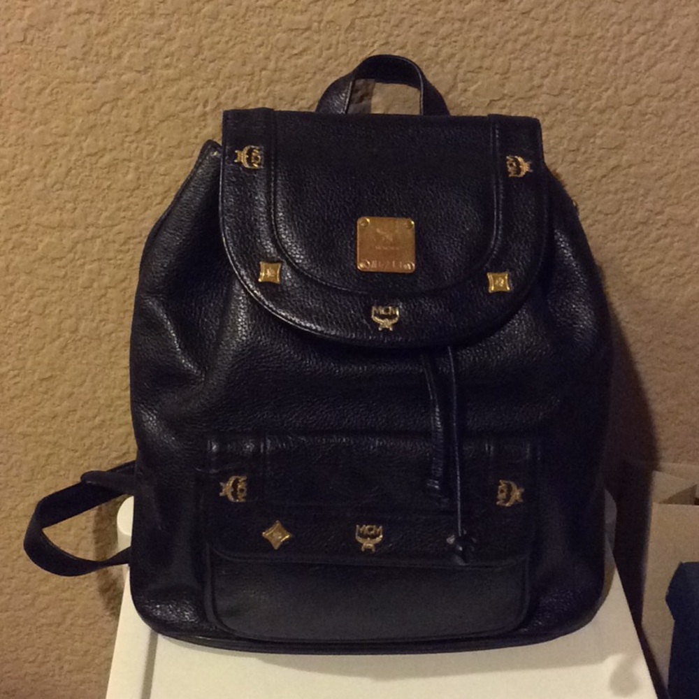 MCM Black Leather Backpack with Gold Hardware